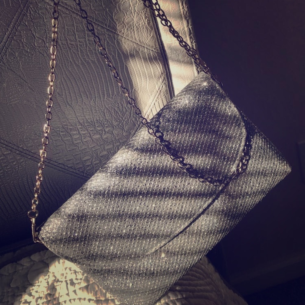 Gold link Rosemary silver crossbody bag.